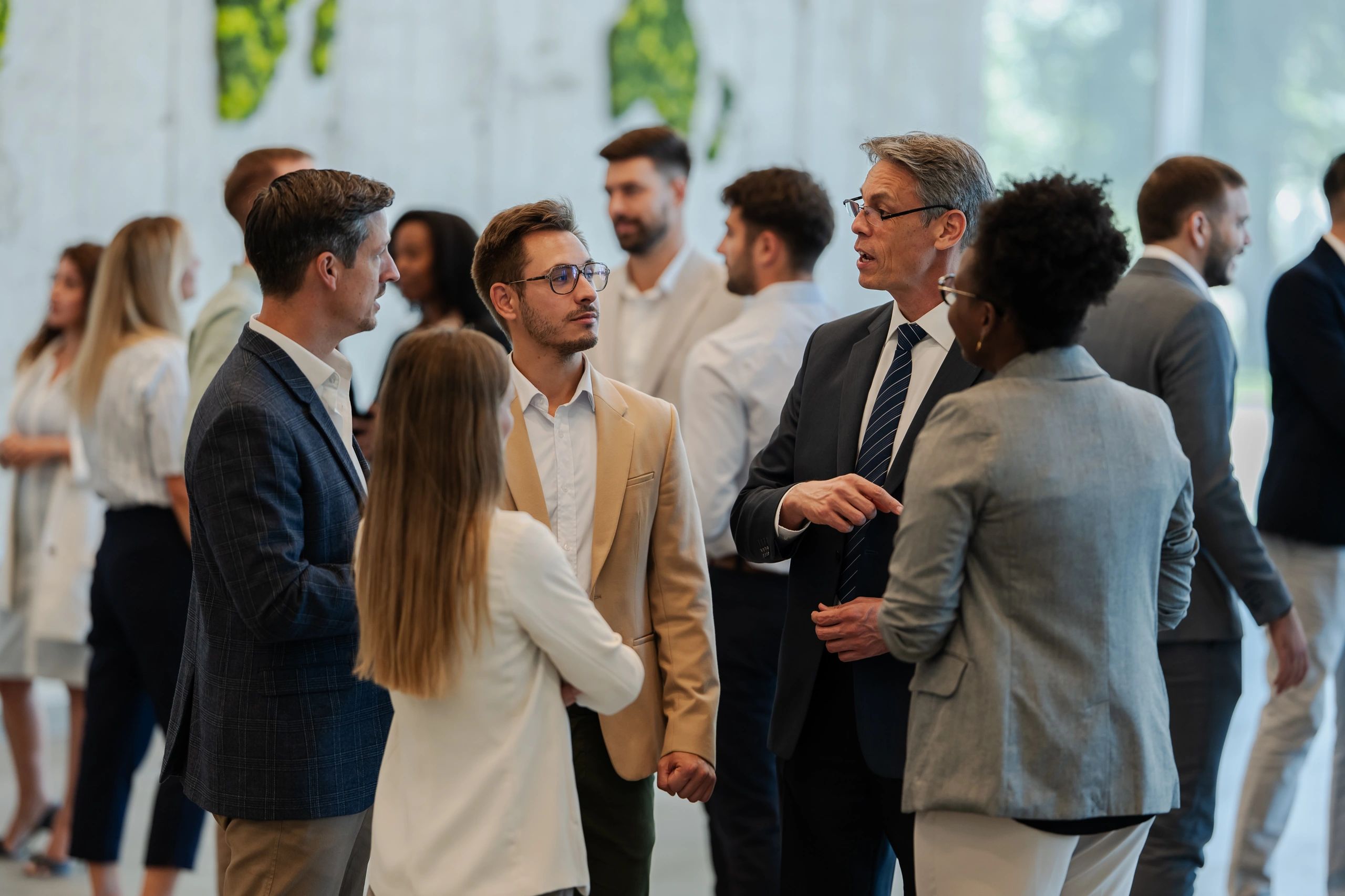 Young professionals networking at a business conference